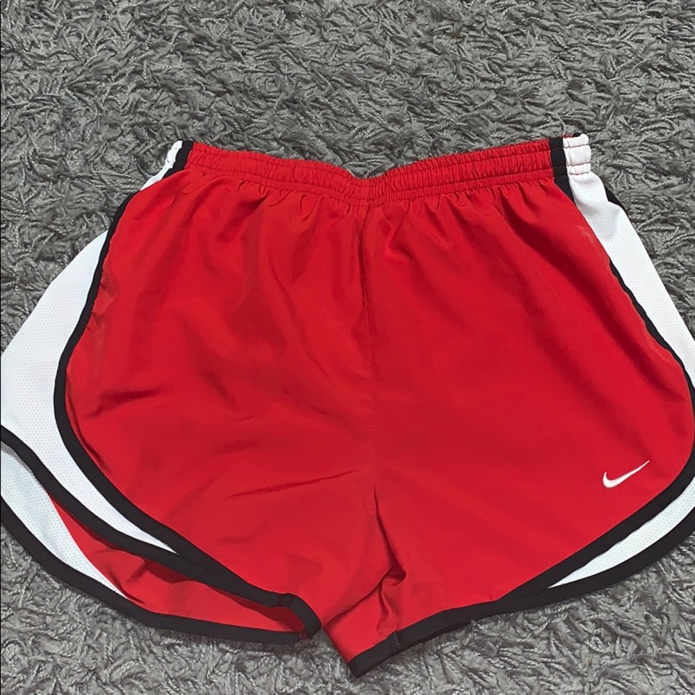 Red Nike shorts